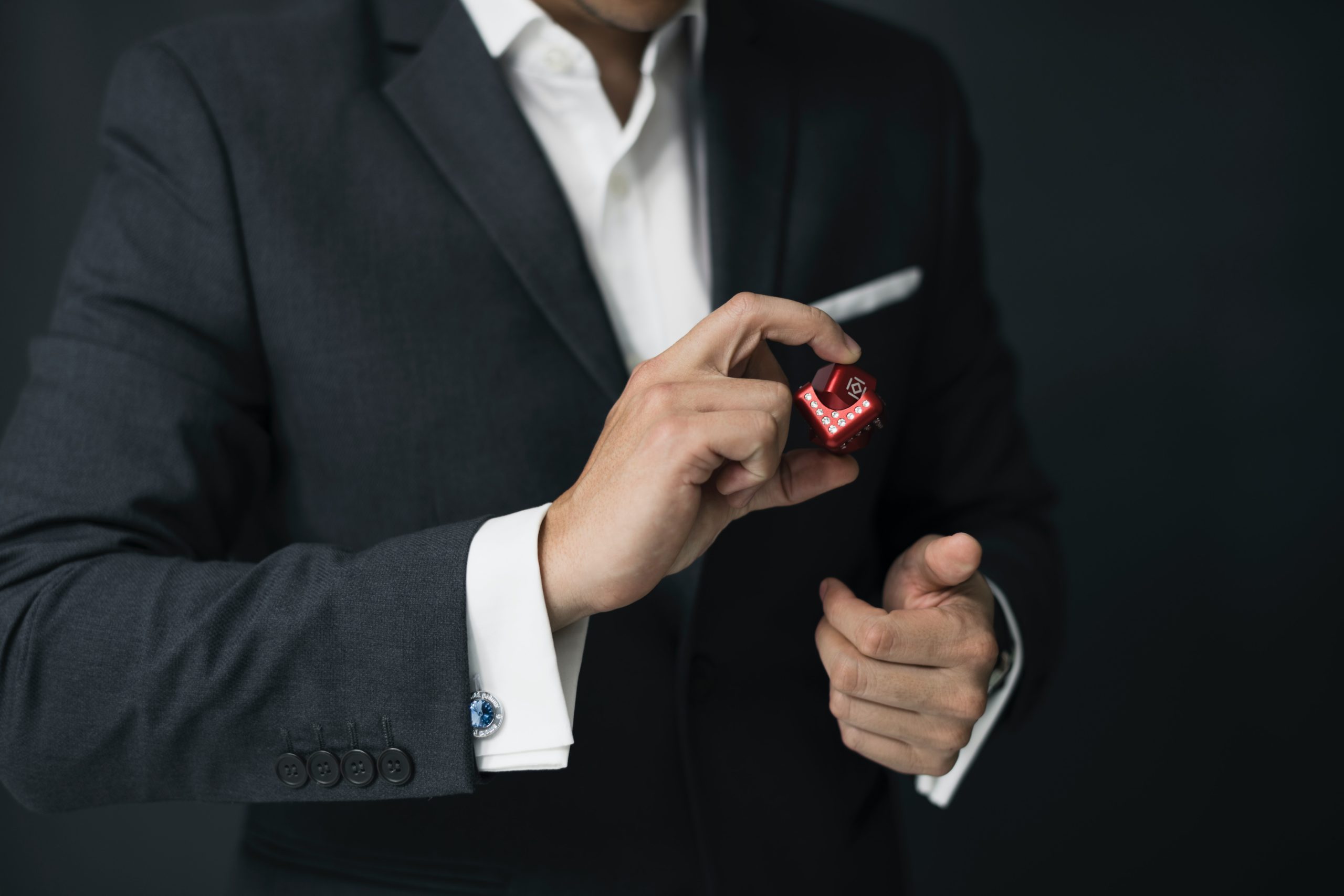 image of person in a suit showing shoulders down to their hips, signifying CEOs