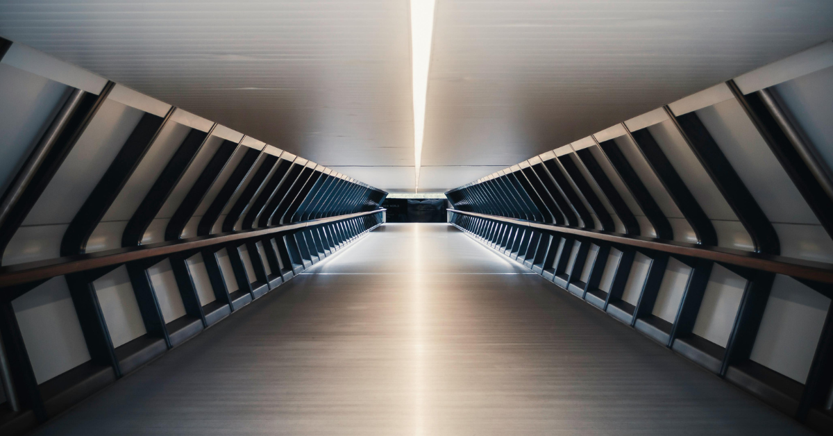 gray tunnel in London, signifying remuneration