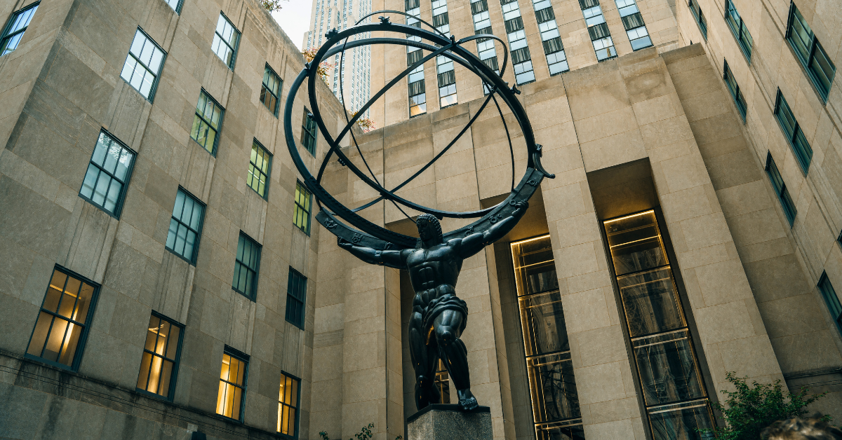 NEW YORK CITY, NY - DEC 2022 Atlas statue and St. Patrick's Cathedral