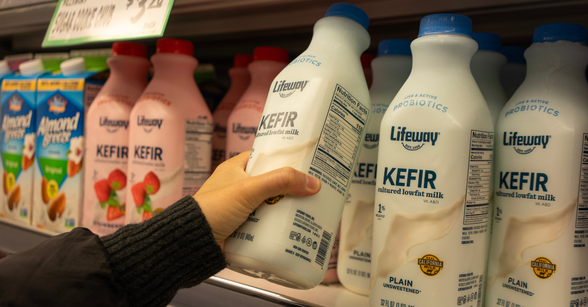 A shopper chooses a bottle of Lifeway low-fat unsweetened kefir at a WinCo Foods store in Tigard, Oregon. Lifeway Kefir is a tart and tangy cultured milk smoothie.