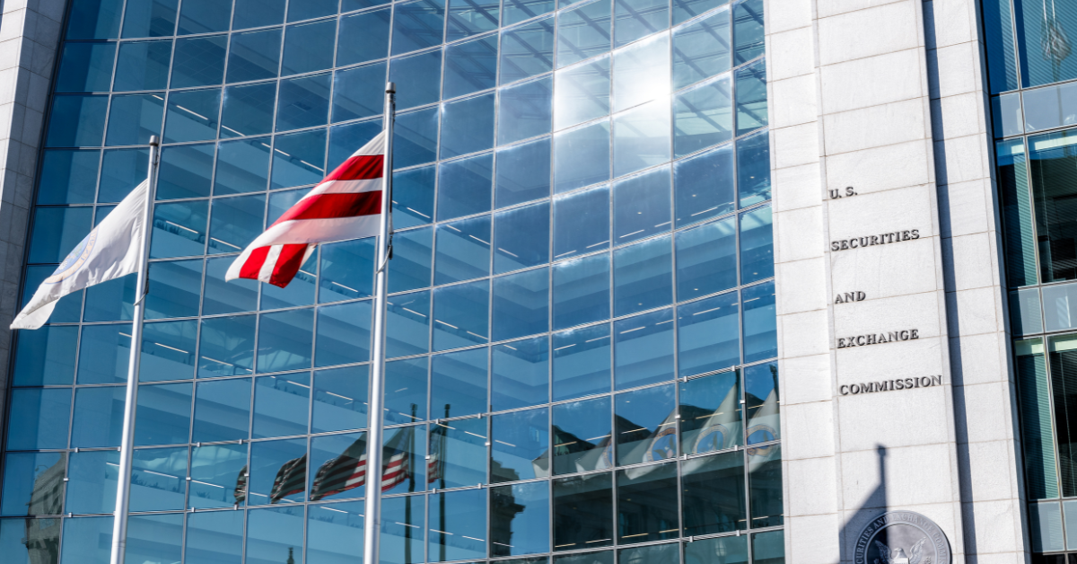 Washington DC, USA - October 12, 2018: United States Securities and Exchange Commission SEC architecture closeup with modern building sign and logo with red flags by glass windows SEC