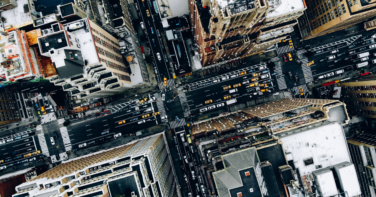 cityscape metropolis infrastructure, traffic cars, yellow cabs moving on city streets and crossing district avenues