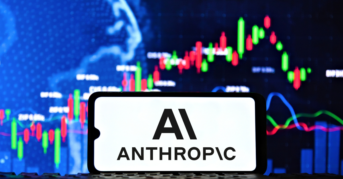 Anthropic AI logo on a smartphone screen with a stock market chart in the background